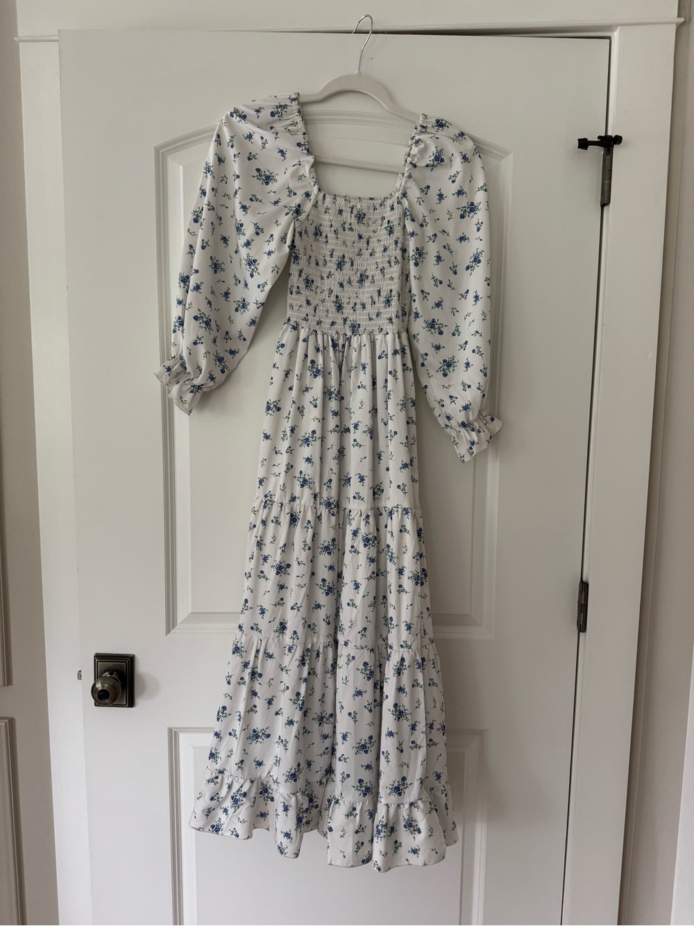 White smocked Maxi Dress with Blue Floral Print. Size medium